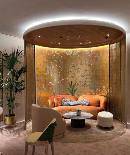 Boutique salon with a gilded curved wall, Cartier Jeddah