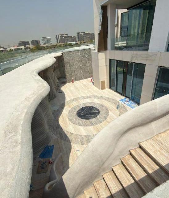 Curved stone terrace of a residence under construction, Dubai Hills